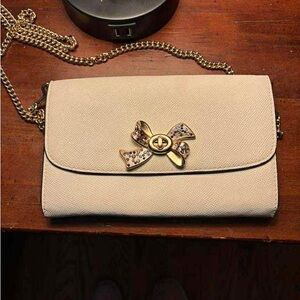 Elegant Cream Clutch with Gold Chain